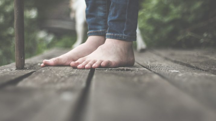 Bare Feet on Wooden Deck Bare Feet on Wooden Deck